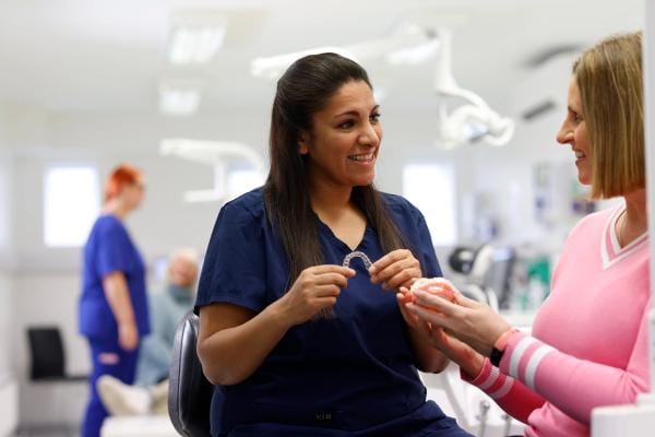 York Orthodontist explains Invisalign to a patient
